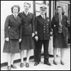 Click image for larger view. E/O Esther Whittaker, E/O Vernetta Grasswick, Captain LeBlanc of the Lady Rodney, and E/O Helen Black, on board the Lady Rodney en route from Southampton to Halifax, July, 1946. Photo courtesy of Leah Halsall. 