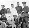 Rev. Raymond Hickey, former instructor at St. Thomas College in Chatham N.B. (pictured at far right), Major Hickey and Jim Morell started a baseball team during the Second 