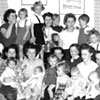 Click for larger image. Picture of group of war brides with their children in St. John's, Newfoundland.