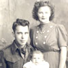 Click here for larger image. Joe Tayor as an infant with his father, Joseph and mother, Jenny.